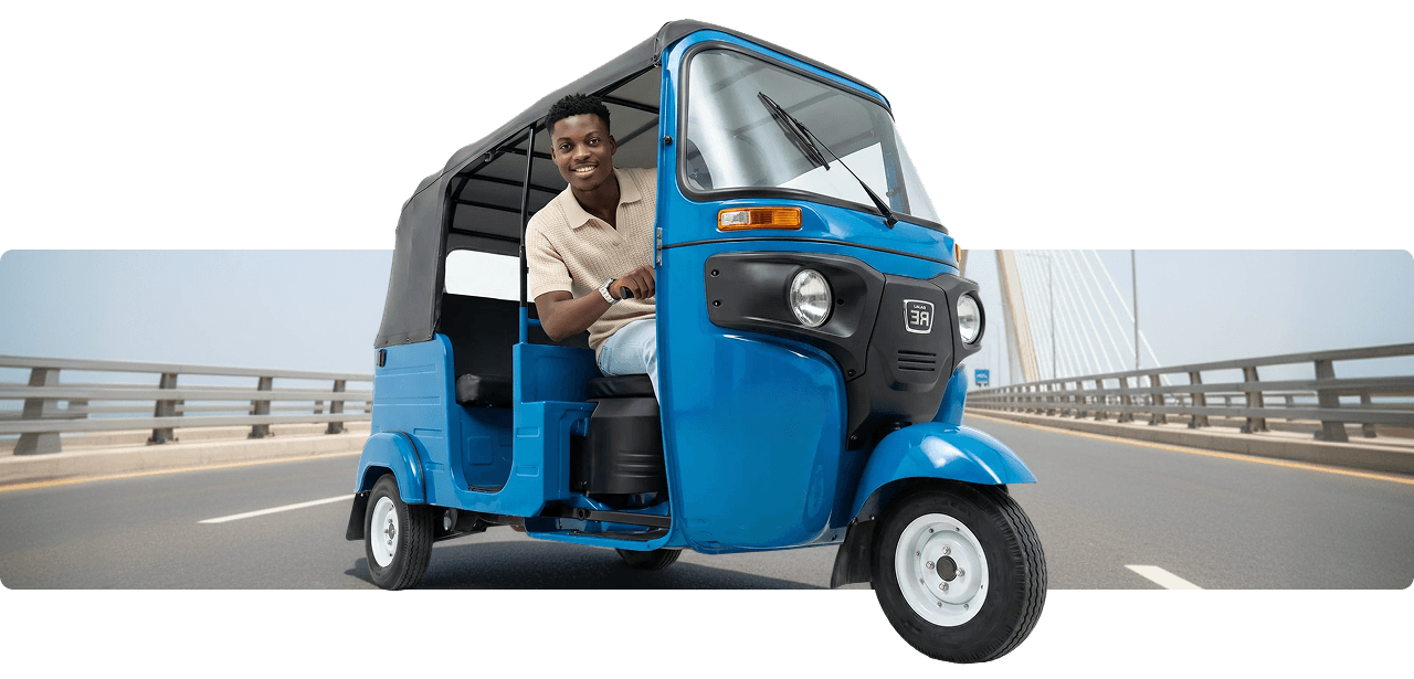 Drift driver in a bajaj tuk-tuk on the road